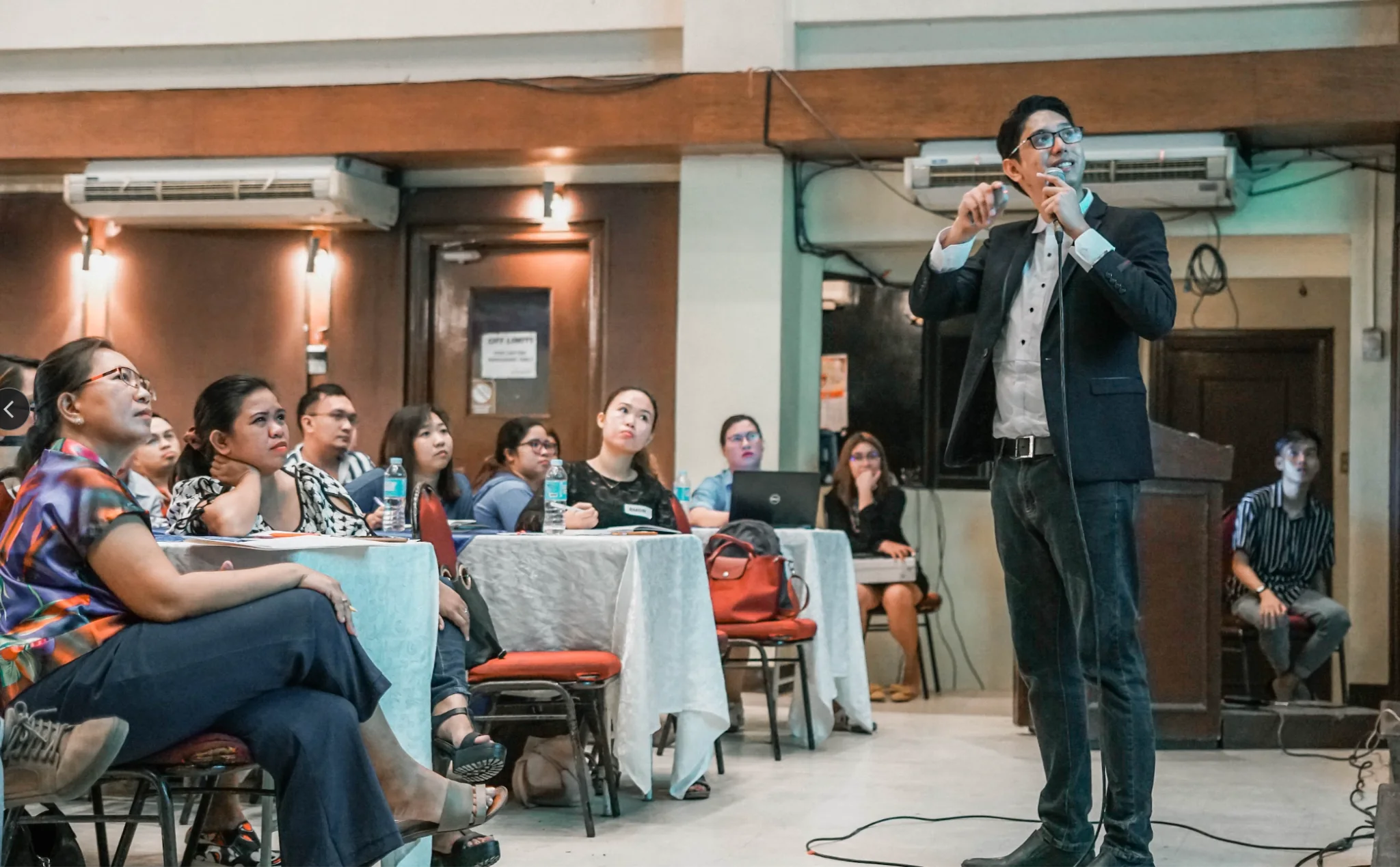 Maj Custodio presenting at a live event